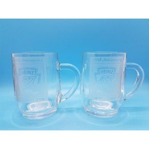 (2) HEINZ 57 VARIETIES 100TH ANNIVERSARY CLEAR GLASS MUGS  1886 - 1996 Etched